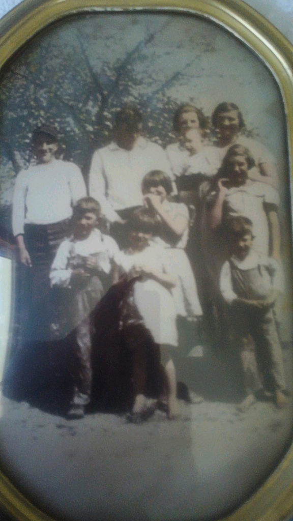 Husband's father with his parents and siblings.